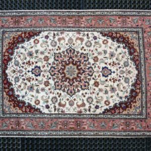 fine tabriz rug on cleaning pads