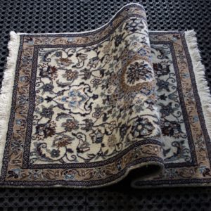 a folded nain rug