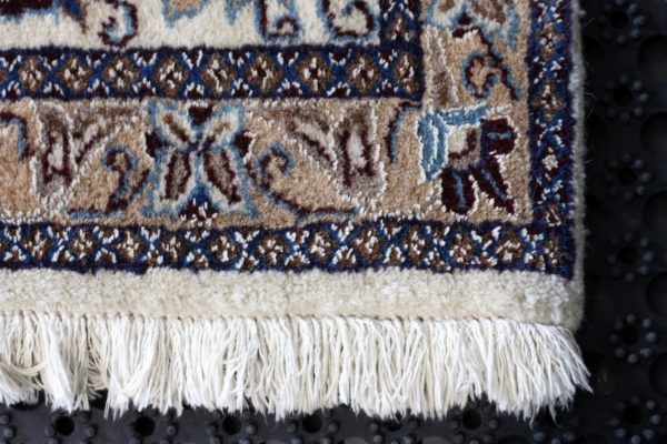 close up of a nain rug
