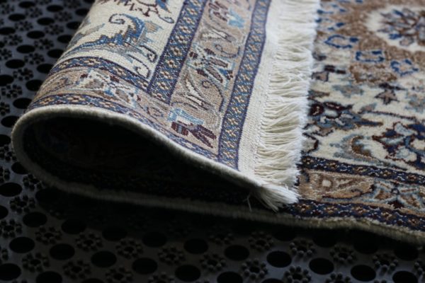 close up of a nain rug