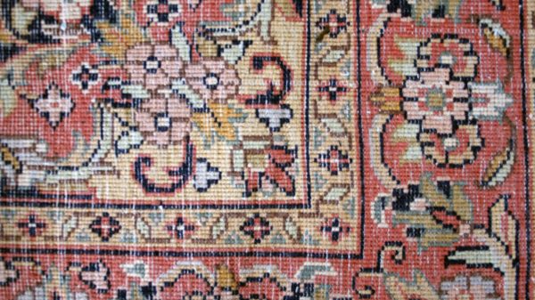 close up of the bottom of a qom rug